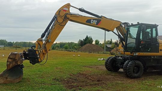 Usługa koparką kołową Cat 313 D