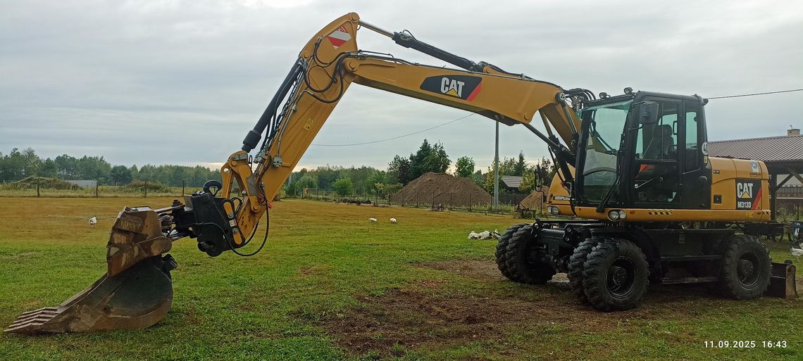 Usługa koparką kołową Cat 313 D Usługa koparką kołową Cat 313 D